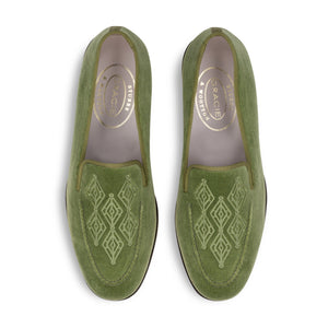 Top view of men’s Lattice Sage Venetian loafers showcasing green velvet, matching grosgrain trim, and lattice embroidery on a white background