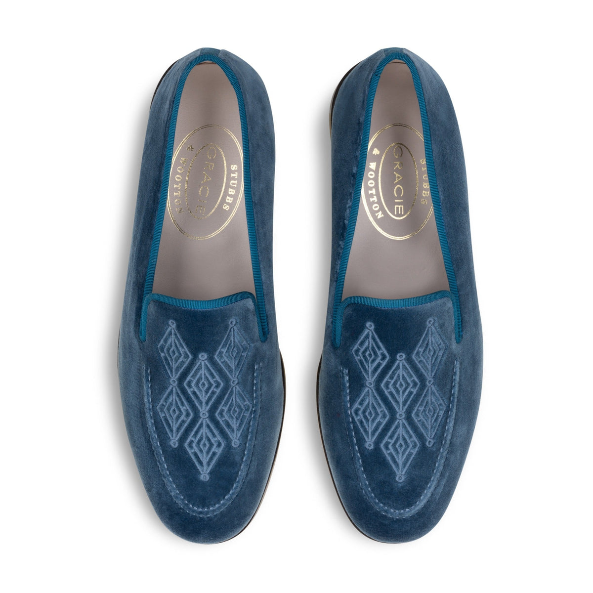 Top view of Men’s Lattice Ink Venetian loafers showcasing navy velvet, grosgrain trim, and lattice embroidery