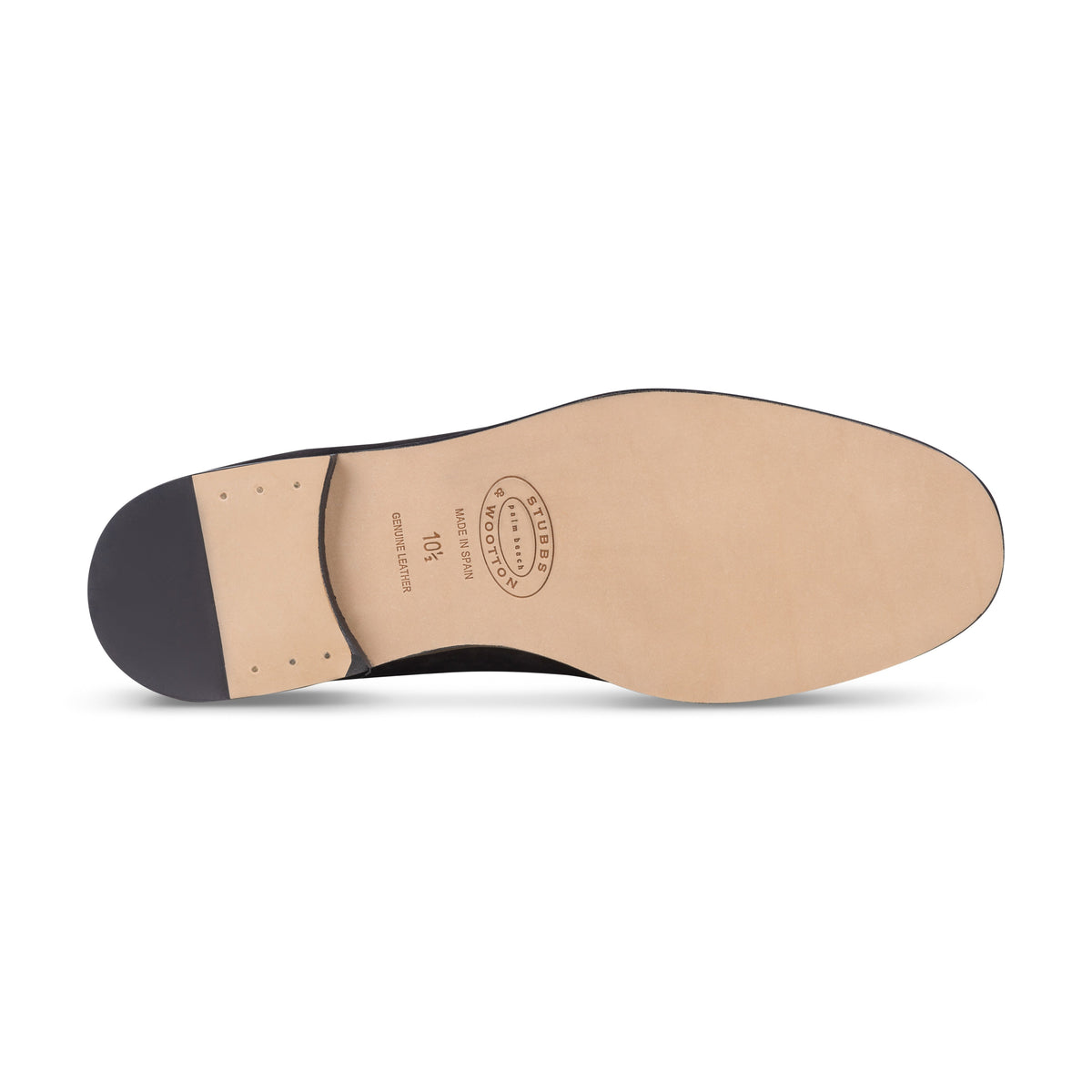 Bottom view of men’s Stripes Camel Leather Lux loafer showcasing its leather sole and stacked heel against a white background