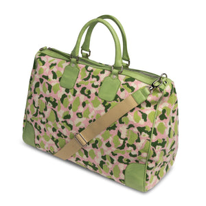 Our Hidden Palm Needlepoint Weekender item is photographed here against a white background.