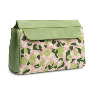 Front three-quarter view of Hidden Palm Needlepoint Traveler showcasing its needlepoint duck camouflage pattern and flap closure with a white background