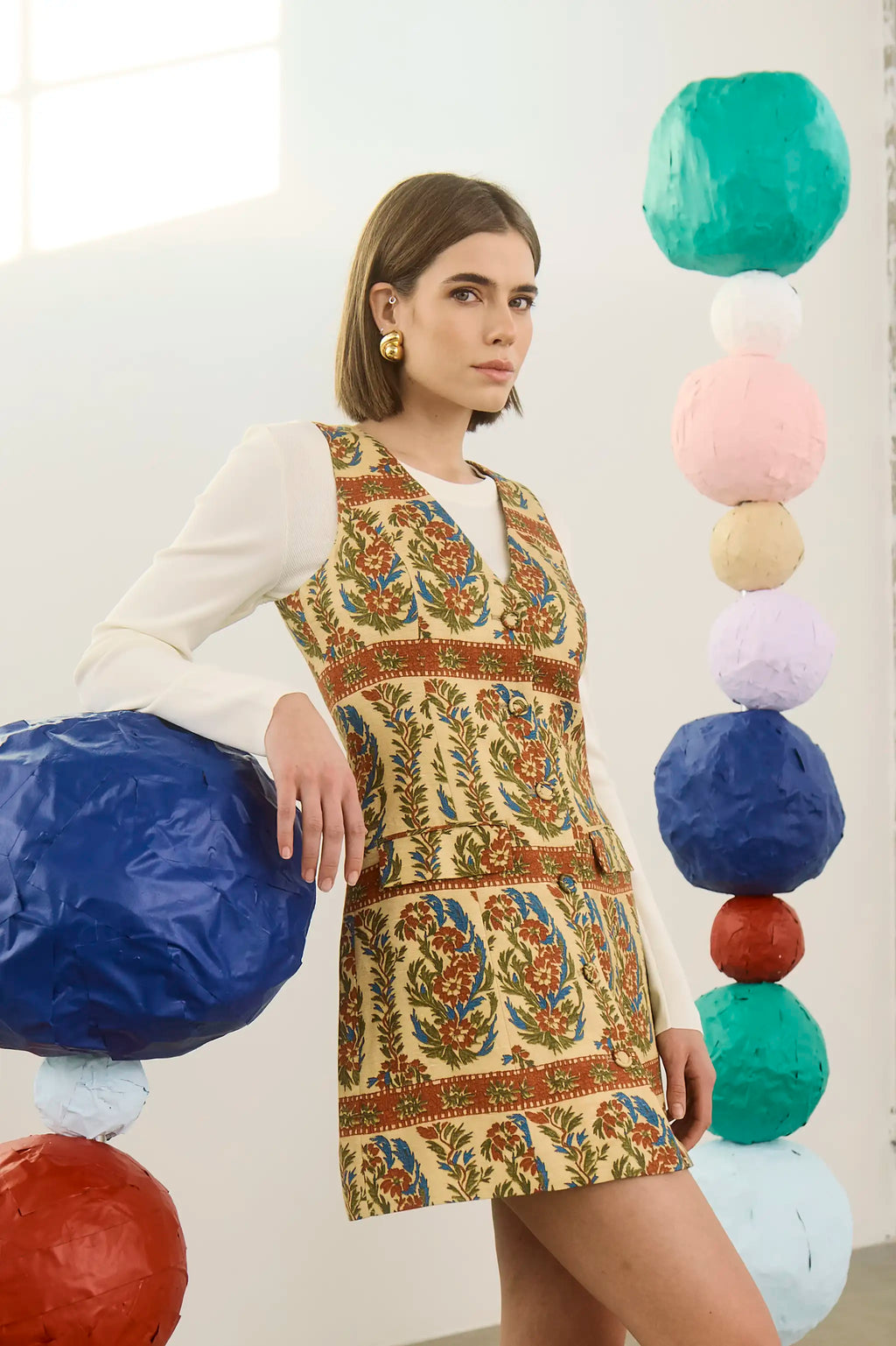 The Suni Dress in Amber Glen Cream paired with the Callie Sweater in Ivory. 