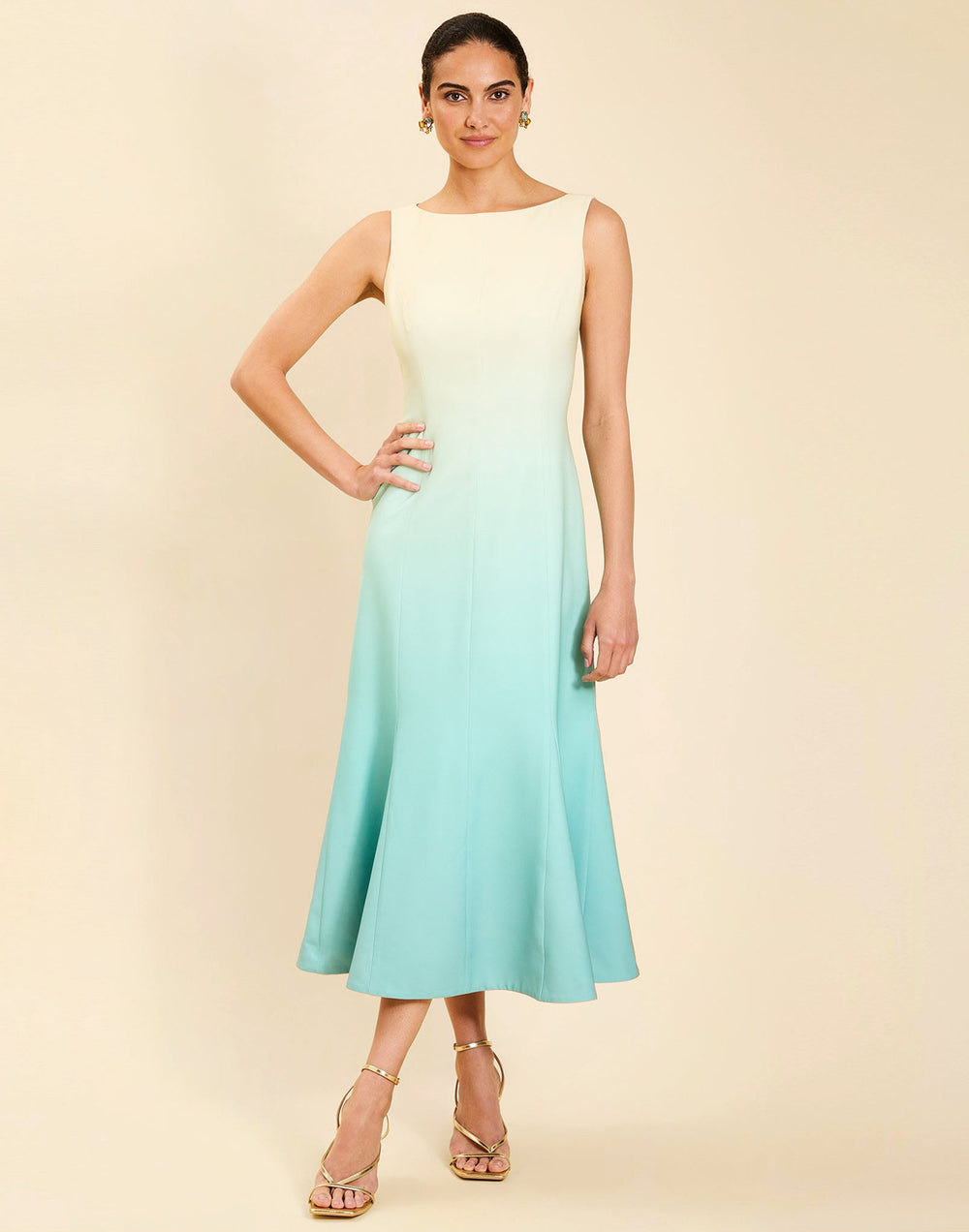 Woman wearing the Mestiza Sunnyside Convertible Midi Dress in Tuscan Daydreaming print, featuring a convertible neckline, fitted bodice, fit-and-flare skirt, and lightweight stretch crepe fabrication.