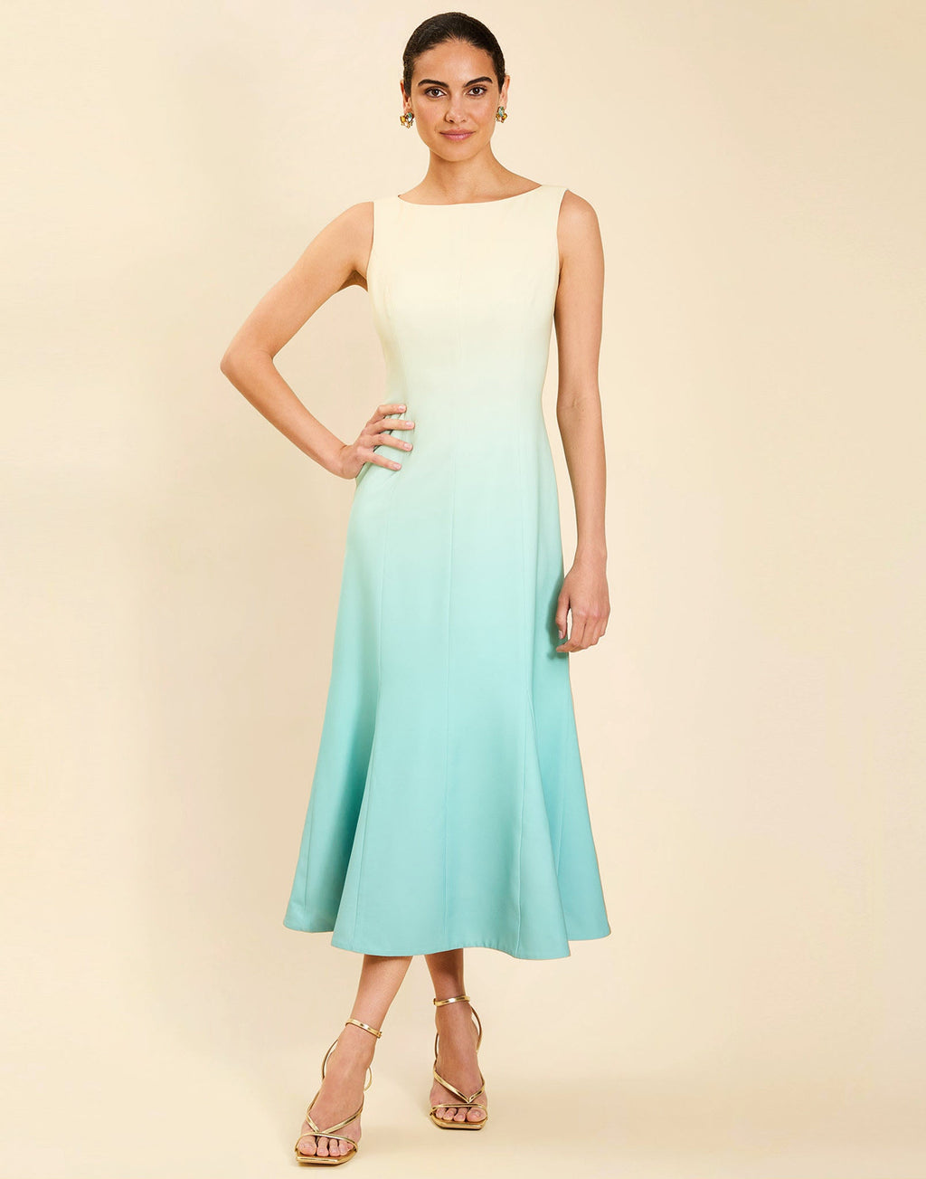 Woman wearing the Mestiza Sunnyside Convertible Midi Dress in Tuscan Daydreaming print, featuring a convertible neckline, fitted bodice, fit-and-flare skirt, and lightweight stretch crepe fabrication.