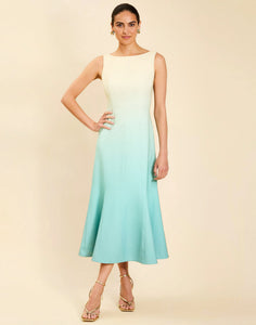 Woman wearing the Mestiza Sunnyside Convertible Midi Dress in Tuscan Daydreaming print, featuring a convertible neckline, fitted bodice, fit-and-flare skirt, and lightweight stretch crepe fabrication.