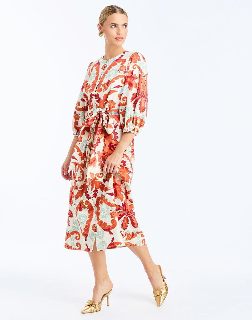 side - Suzanna Midi Dress in Rossa Waltz is an A-line daytime midi with balloon sleeves and self-tie belt