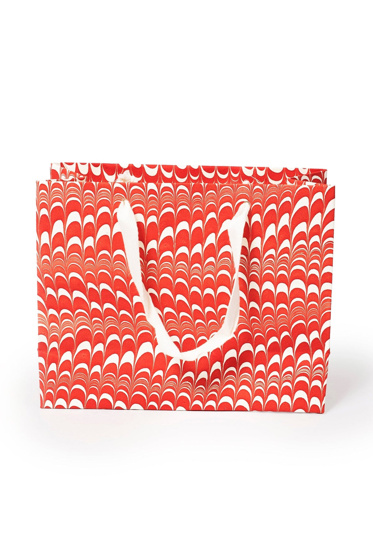 Medium red and white candy cane swirl hand marbled gift bag with white handles by Inner Child