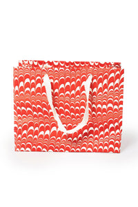 Medium red and white candy cane swirl hand marbled gift bag with white handles by Inner Child