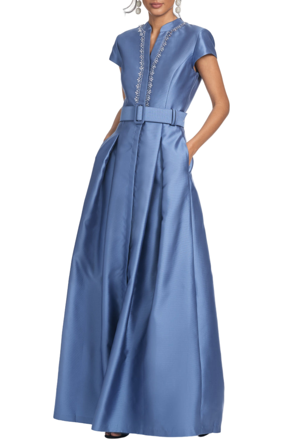 Front three-quarter view of Embellished Marta gown in Twilight showcasing beaded trim, cap sleeves, belted waist, and full pleated skirt on white background