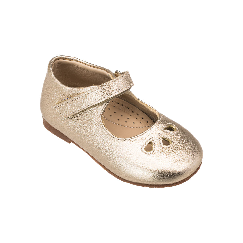 Three-quarter view of the Toddler Rosie Mary Jane in Gold showcasing petal-shaped cut-outs and pebbled gold leather with white background