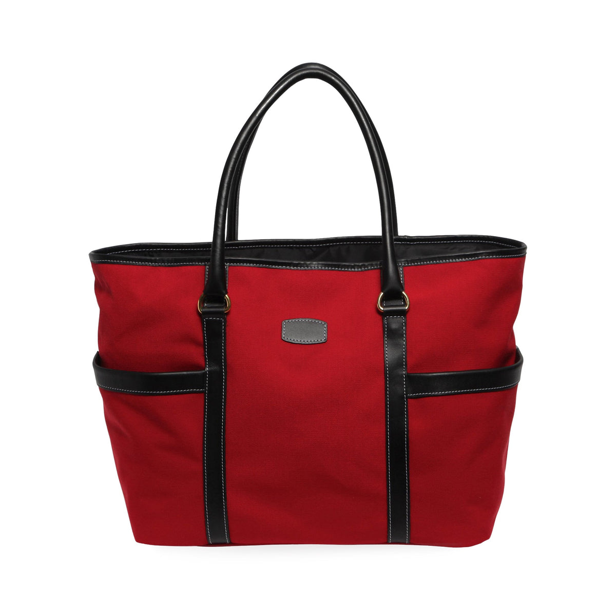 Front view of Town and Country Tote showcasing red canvas body with black leather trim, two exterior side pockets, and double top handles on white background