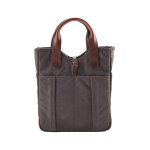 Front view of Bark Canvas Whiskey Tote showcasing brown leather handles and four exterior slip pockets on white background