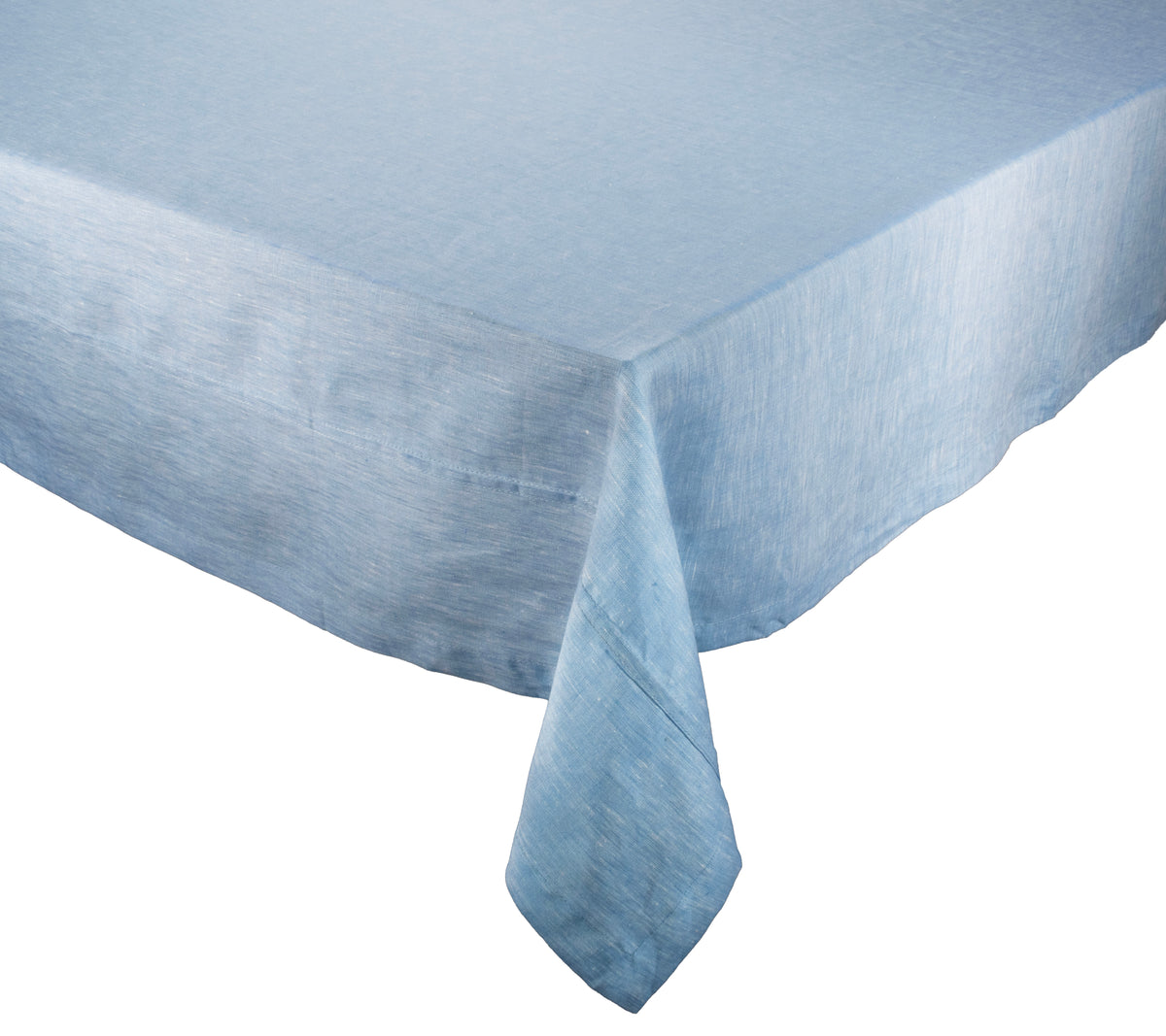 Angled view of Chambray Fringe Tablecloth in Blue showcasing its two toned linen weave against a white background