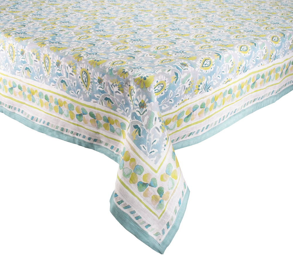 Corner view of Mira Tablecloth in Seafoam & Green showcasing paisley pattern and decorative border on a white background