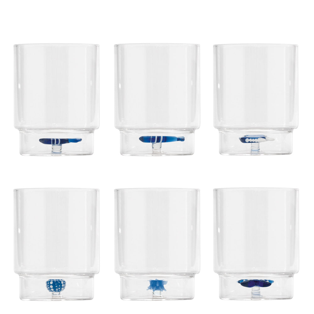 Front view of Teca Mare tumbler set of 6 with clear glass and small blue sea creature figurines in bases on white background