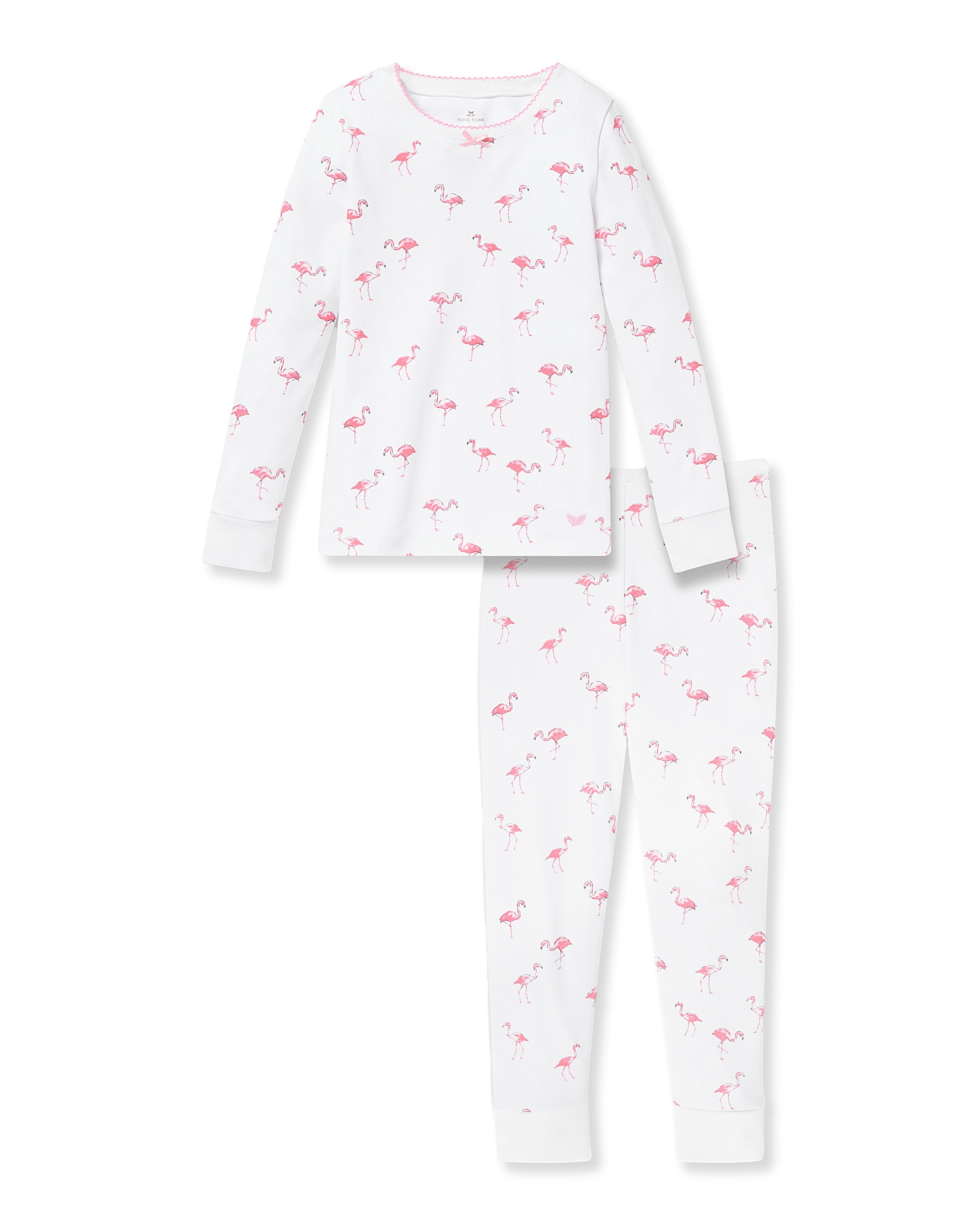 The Kid’s Pima Snug Fit Pajama Set in Flamingo by Petite Plume features a white long-sleeve top and pants with a pink flamingo pattern, perfect for cozy nights and coordinating with our family sleepwear collection.