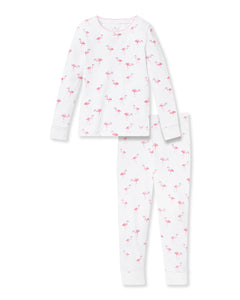 The Kid’s Pima Snug Fit Pajama Set in Flamingo by Petite Plume features a white long-sleeve top and pants with a pink flamingo pattern, perfect for cozy nights and coordinating with our family sleepwear collection.