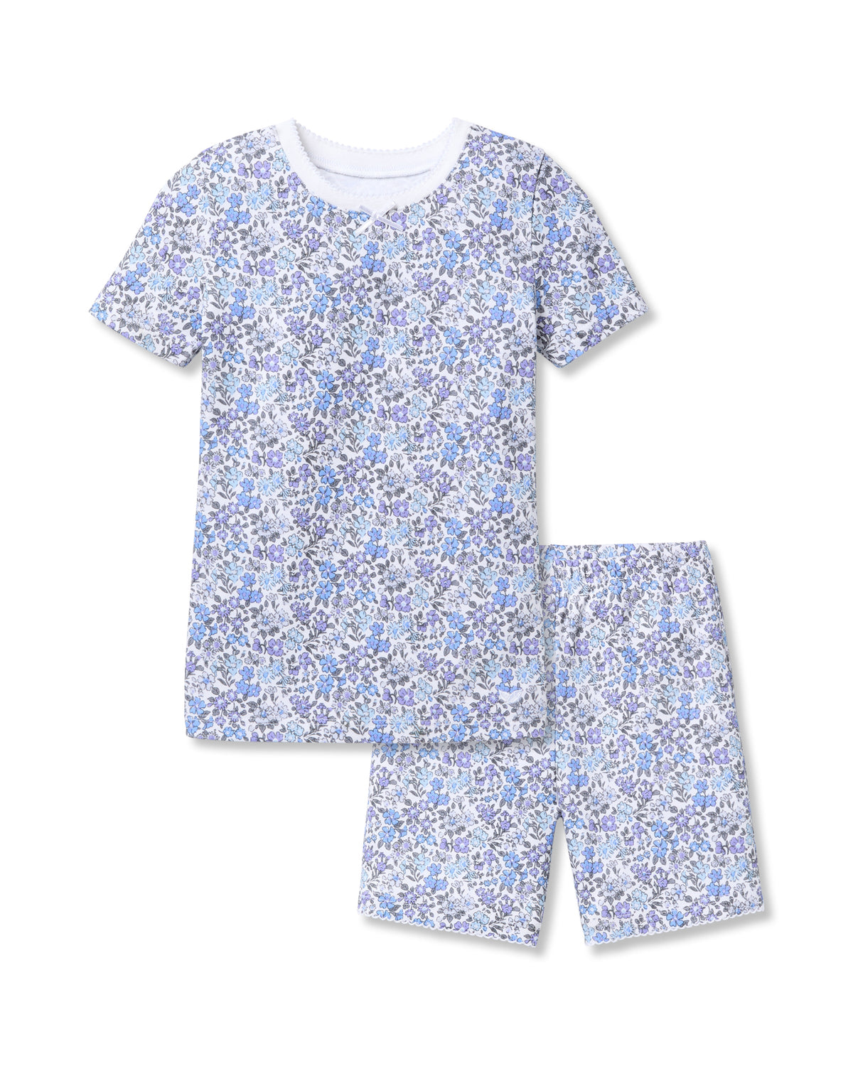 The Kids Pima Snug Fit Short Set in Fleur dAzur by Petite Plume features a vintage floral pattern on a short-sleeve top with a white collar, and matching shorts. Crafted from soft Pima Cotton, this set offers luxurious sleepwear for children.