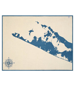 Cream blanket with dark blue map of the Hamptons region and compass rose in lower left corner.