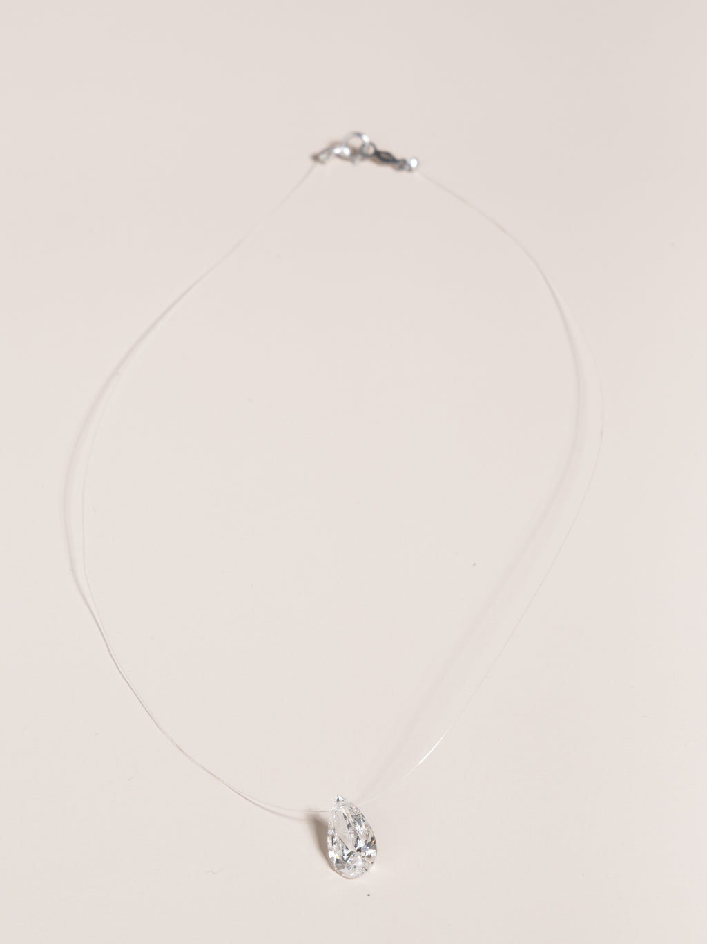 Pear Shaped “Floating” Diamond Pendant
