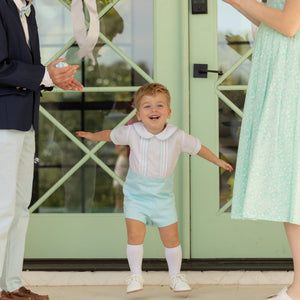 Toddler boy wearing the Henry Duvall Benjamin Button-On, a traditional heirloom-style outfit designed for special occasions and family photos.