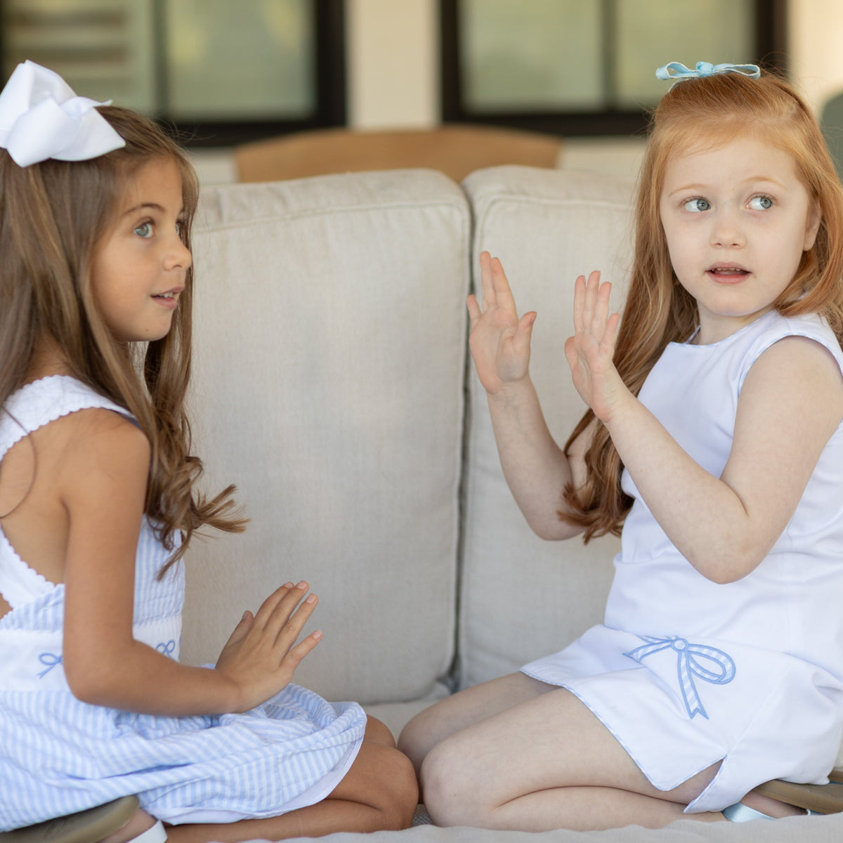 Girl wearing the Henry Duvall Schuyler Dress, a classic girls shift dress designed for summer outings and sibling matching.