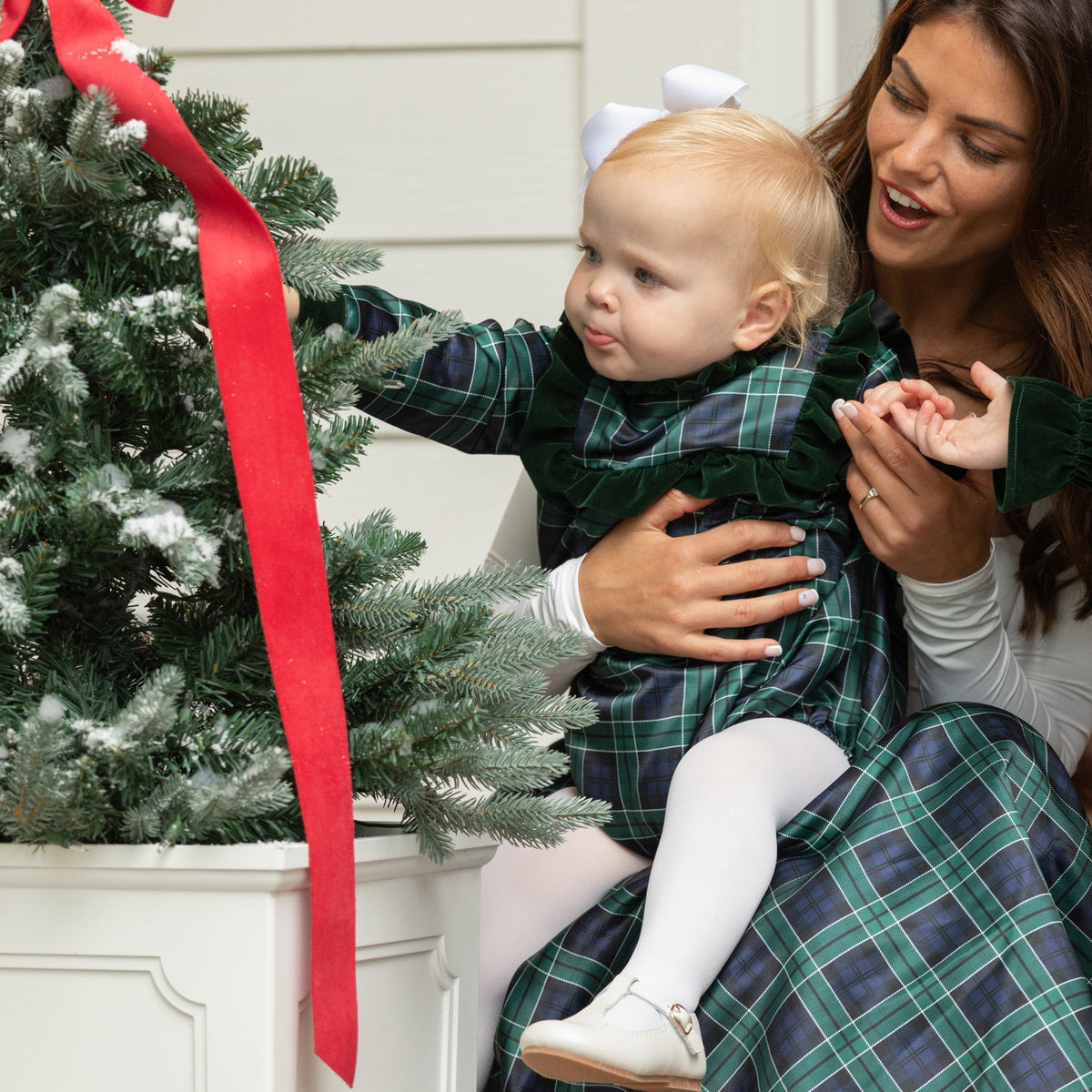 Classic baby girl tartan holiday bubble, Nora Bubble in Newbury Tartan with green velvet trim, perfect for fall family photos and festive occasions by Henry Duvall.