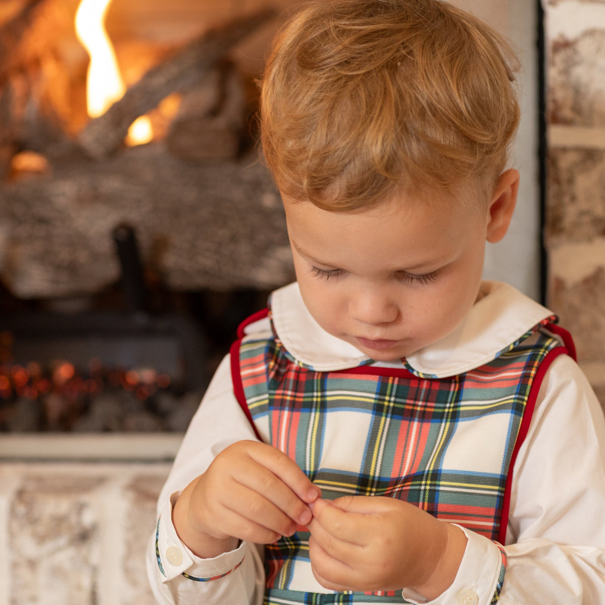 Henry Duvall classic baby boy jon jon in traditional red tartan, heirloom toddler outfit with shoulder buttons and stride snaps, inspired by English heritage style