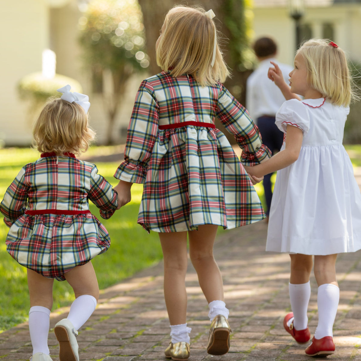 Girl's plaid holiday dress in Townsend Tartan with bow waist detail, vintage-inspired fit, perfect for family photos and festive gatherings – Henry Duvall classic