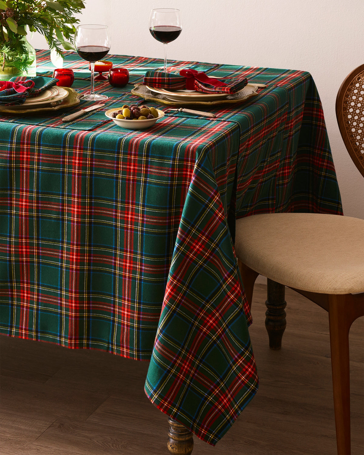Front view of Signature Twill Tablecloth in Kensington Tartan showcasing multicolor plaid pattern with a set dining table