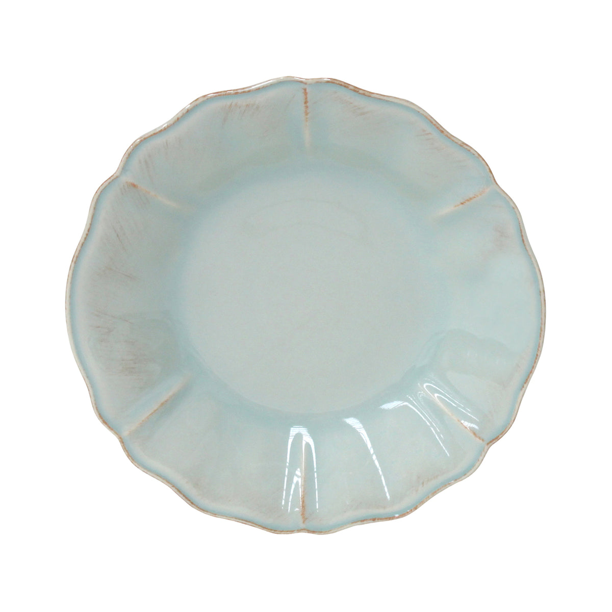 Top view of Alentejo pasta plate showcasing scalloped rim and sun-washed turquoise glaze on white background