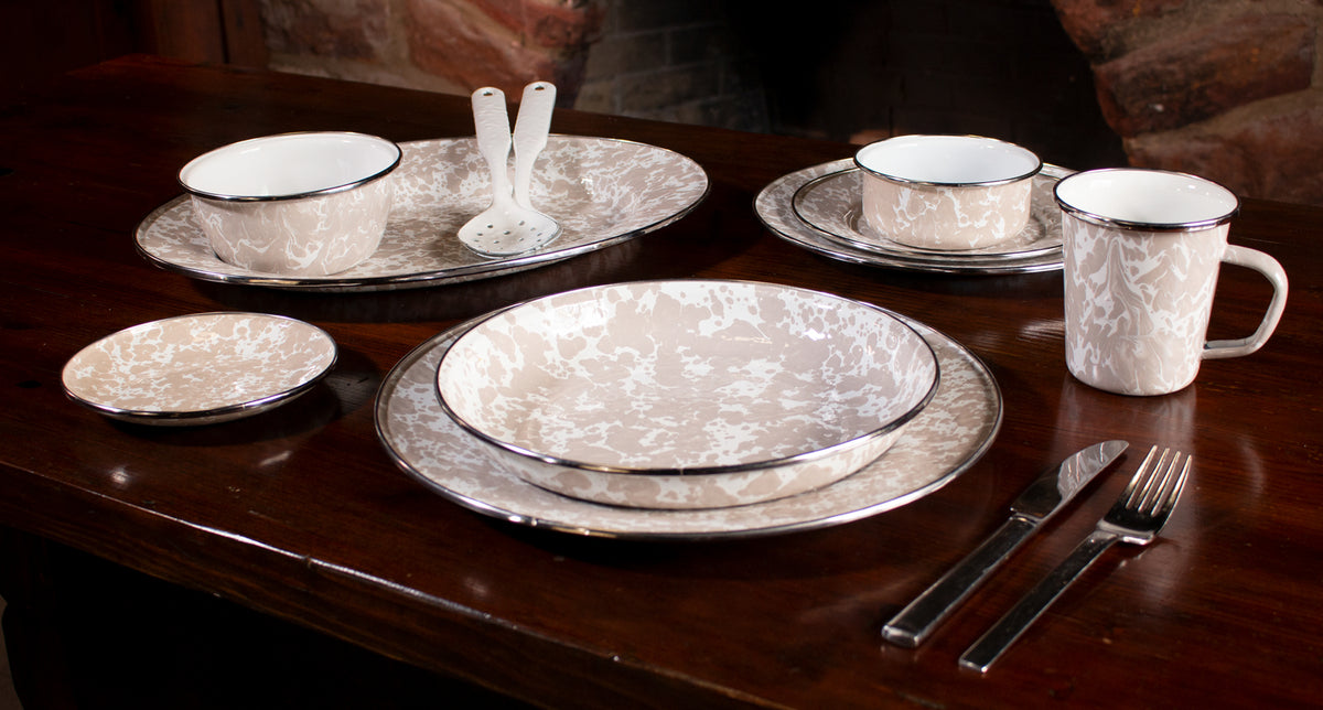 Front view of Adult Mugs in Taupe Swirl, Set of 4 showcasing porcelain enamel and stainless steel trim with a table setting background