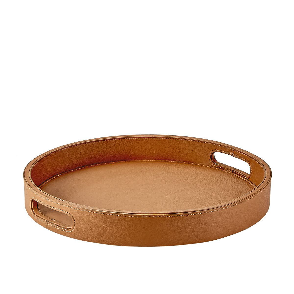 Angled front view of round leather bar tray in British tan with stitched rim and cutout leather handles on white background