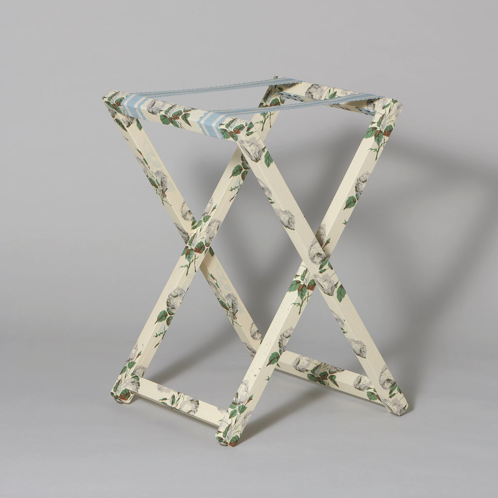 A luggage stand covered in an archive Colefax and Fowler print. Standard size.