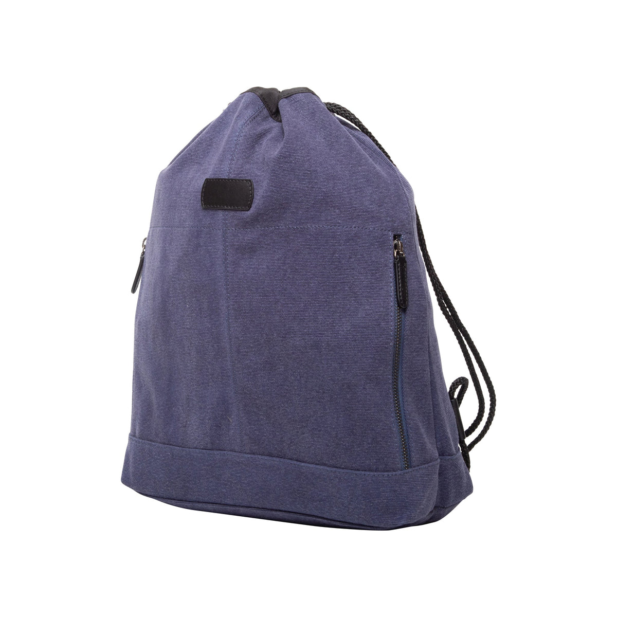 Three-quarter view of blue canvas T. Anthony lightweight backpack showcasing drawstring top, leather trim, and exterior zip pockets on white background