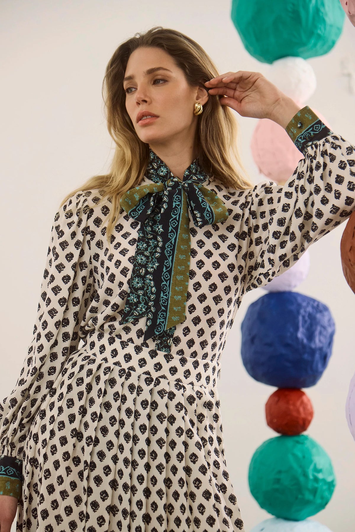 The Tess Blouse in Thistle and Vine Cream paired with the matching Dominic Skirt. 