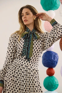 The Tess Blouse in Thistle and Vine Cream paired with the matching Dominic Skirt. 