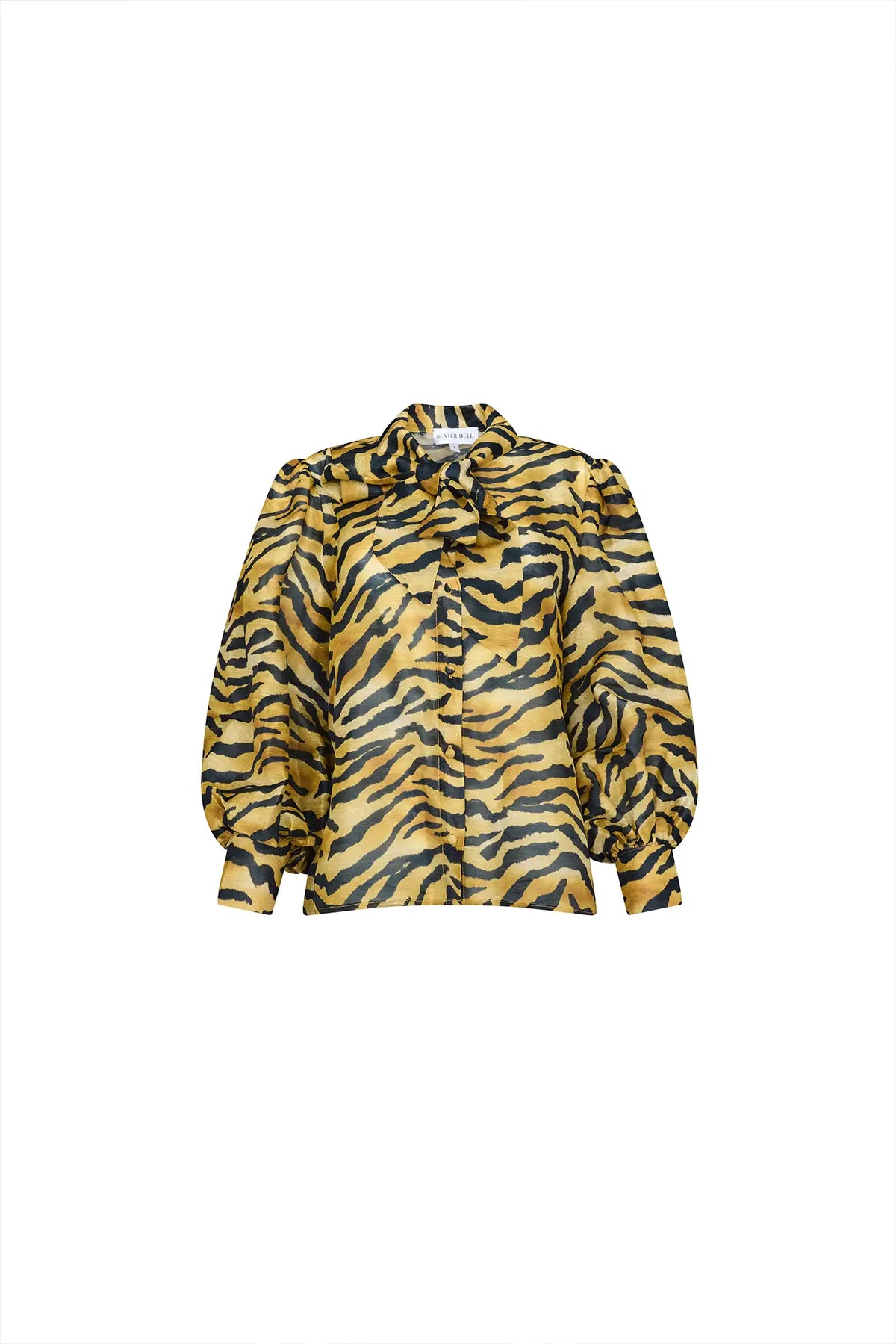 The Tess Blouse in Tiger print, has an elegant tie-front neckline that can be styled into a bow.