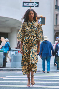 The Suki Skirt is in tiger print this season, with fitted pencil silhouette and easy pull-on design