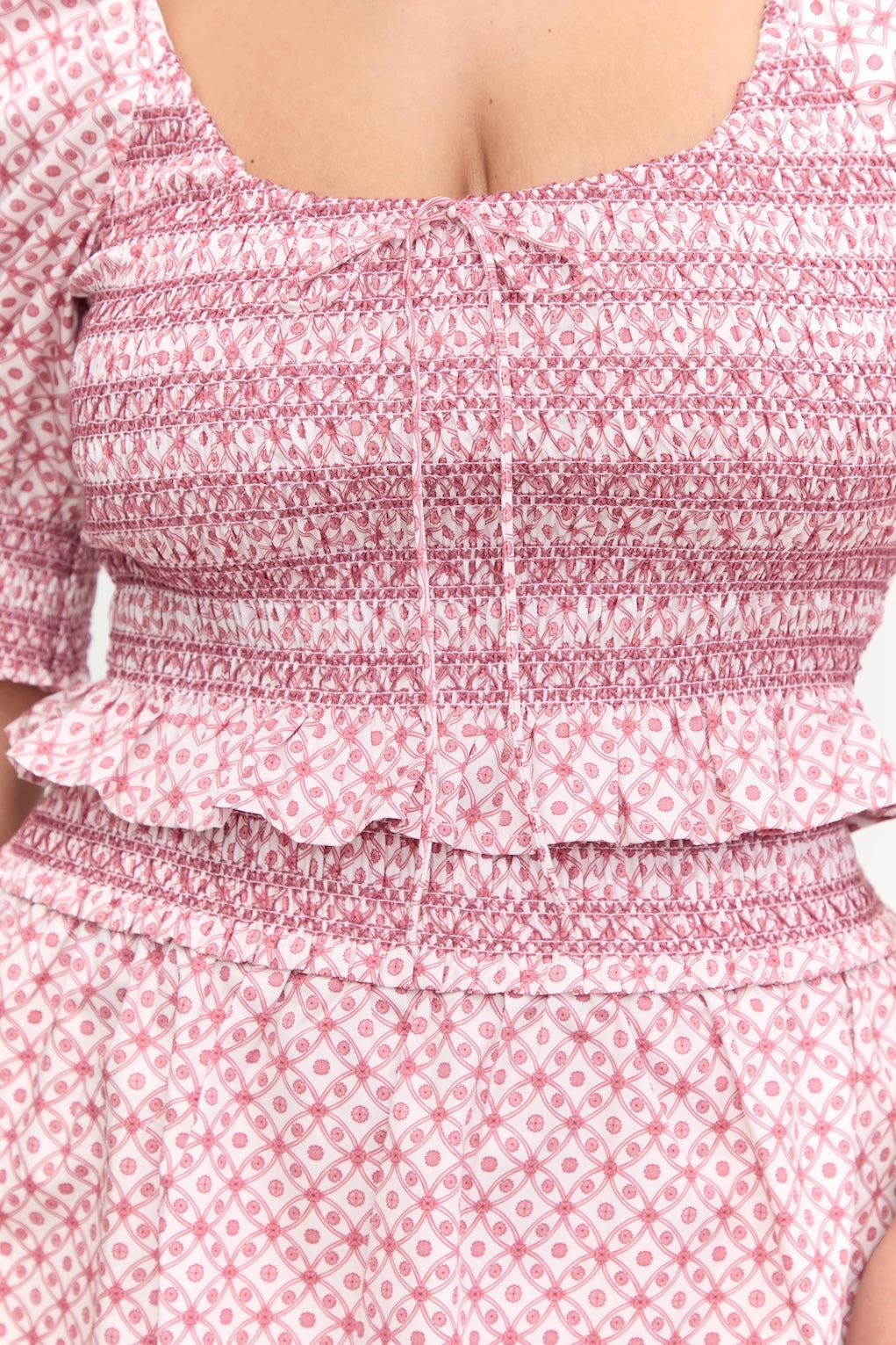 The Madeline Nap Top in Rose Circular Lattice