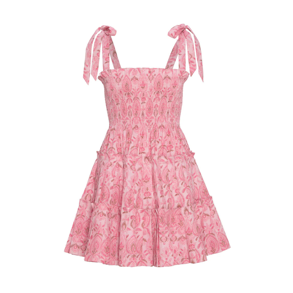 Front view of Charlotte Nap Dress in Pink Palm Ikat showcasing smocked bodice, square neckline, tie straps, and ruffled tiers