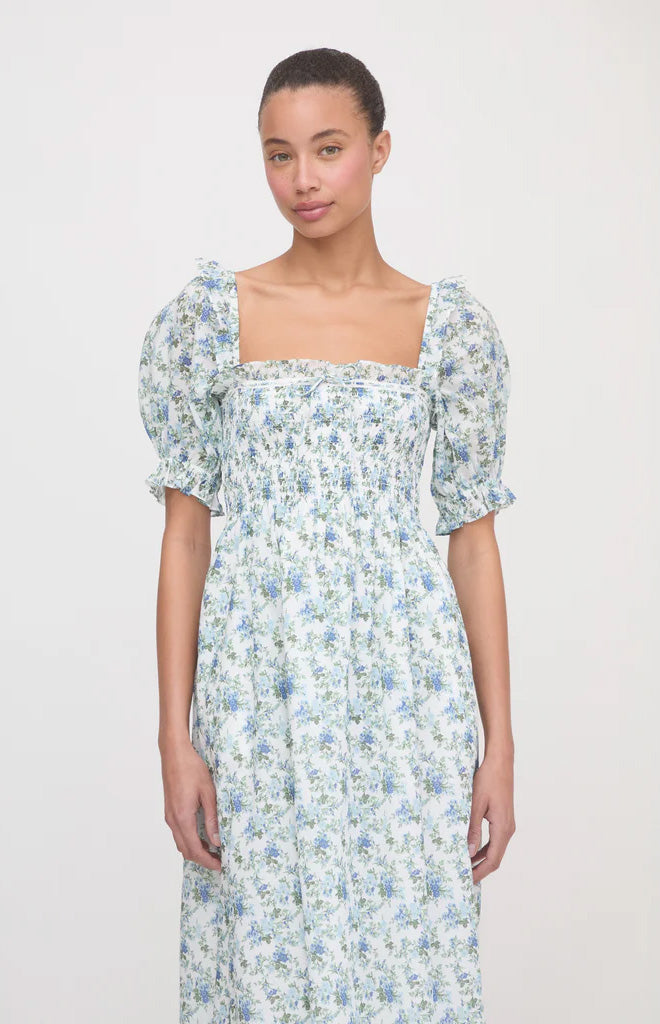 Front view of The Scarlett Nap Dress in English Daisy showing puff sleeves, lace-trim neckline and Nap Smocking