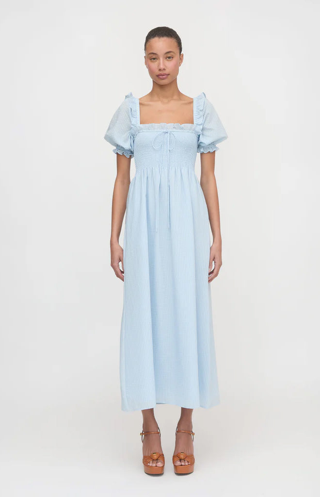 Front view of The Scarlett Nap Dress in Pale Blue showcasing puff sleeves, lace-trim neckline, and ankle-length skirt