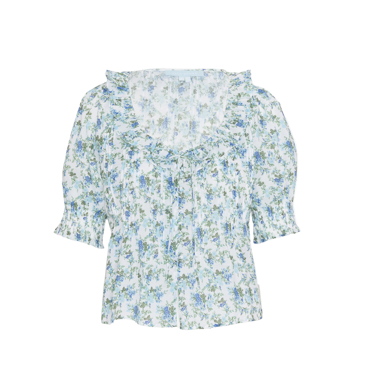 Front view of The Camri Top in English Daisy with ruffled neckline and bow, covered buttons and puff sleeves on white