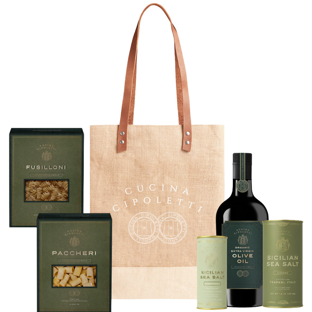 Front view of The Ultimate Gift Bundle with jute tote, 2 pasta boxes, bottle of extra virgin olive oil and sea salt tins