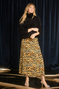 The Suki Skirt is in tiger print this season, with fitted pencil silhouette and easy pull-on design