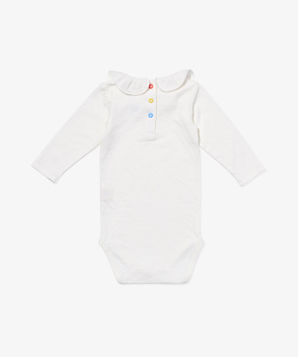 Tink Ruffle One-Piece in Vanilla Piping