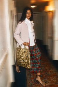 The Tinsley Coat is in our City Lights Gold Sequins Bouclé with a rounded neckline and long sleeves.