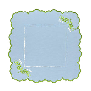 Decorative luxury blue placemat with green scalloped edge and lilly of the valley designs 