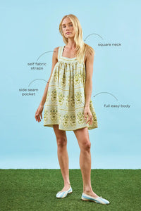 The Tipper Dress, square neck mini dress, in Green Trellis with call outs.